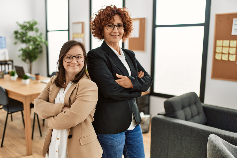 Group,Of,Two,Women,Working,At,The,Office.,Mature,Woman